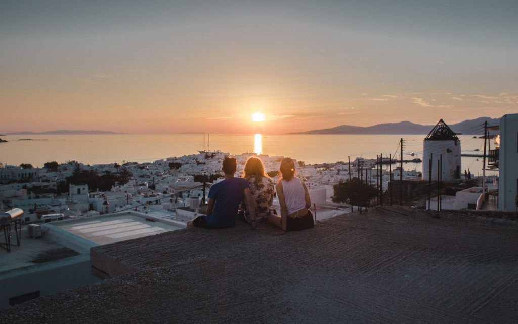 mykonos greece sunset friends